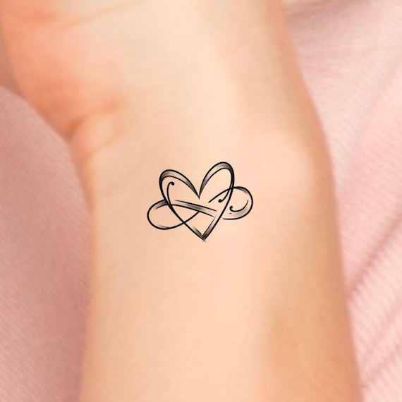 to infinity and beyond wrist tattoo ideas  EntertainmentMesh