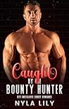 Caught by the Bounty Hunter by Nyla Lily