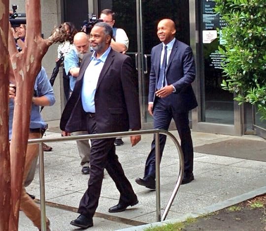 Bryan Stevenson and Anthony Hinton photo Rayhintonwalkingoutofprison2_zpslv1scayd.jpg