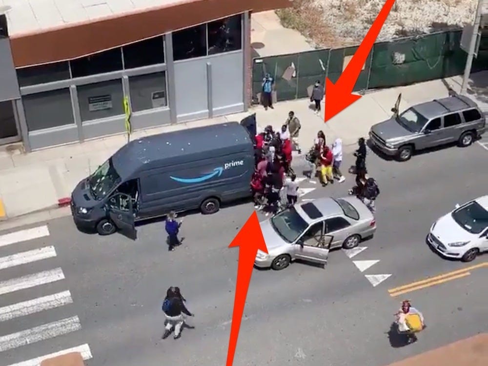 Video Shows Looters Throwing Rocks Raiding Amazon Delivery Van During Protests