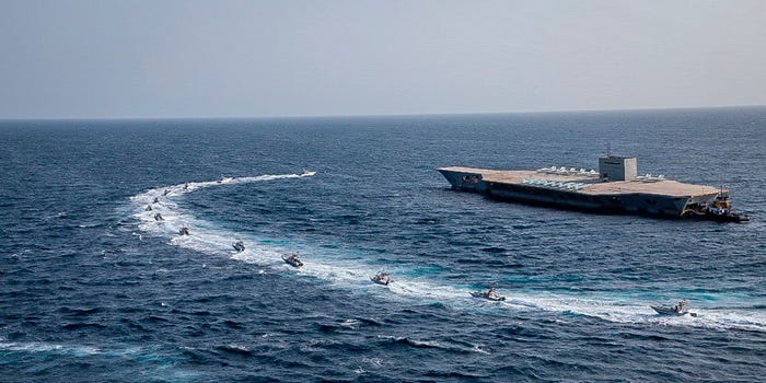 Iran strait of hormuz exercise on replica US aircraft carrier