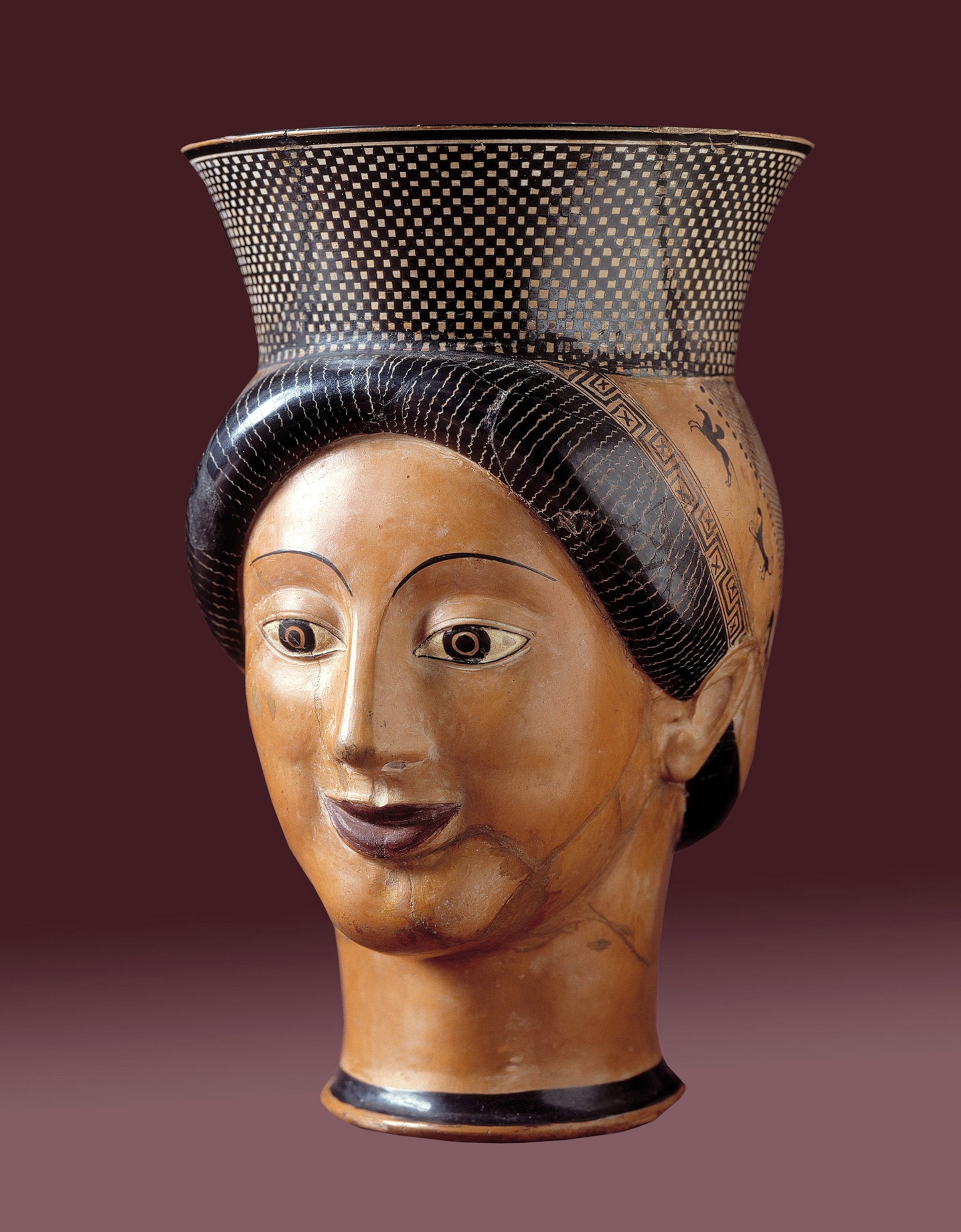 A terra-cotta vessel, perhaps used for pouring out ritual libations, is from the sixth century B.C. and now housed at the Archaeological Museum of Tarquinia, Italy.