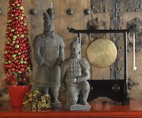 Incorporating Asian style accents can be a fun and interesting way of putting a unique spin on your holiday decor. Things like statues, gongs, vases, jars, and wall art can all provide a charming focal point.