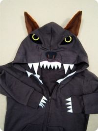 An old hoodie can become an easy (and cozy) animal outfit with some white felt or paper. A wolf, for instance: