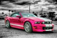 A Hot Pink Metallic Mustang customized by Creations n' Chrome in Valencia, CA.