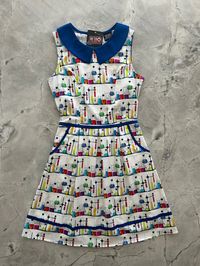 Mod Style Dress Fun and totally functional, this retro dress is bound to be your new favorite!  Shown in our Mad Science print, this 60s style cotton dress features a contrast Peter Pan collar, contrast piping throughout, a-line skirt with side pockets, and a back zippered closure.  Contrast peter pan collar Contrast d