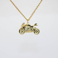 Sport bike crotch rocket style classic motorcycle necklace 10 CZ set in charm 18k gold filled charm Pendant size 30mm x 17 mm Now on new 18k stainless steel heavy gold plated chain *Gold-filled jewelry is jewelry composed of a solid layer of gold (typically constituting at least 5% of the item's total weight) mechanically bonded to a base alloy). Which means like solid gold, this piece is tarnish resistant, fade resistant and water resistant. The stainless steel chain has a thick gold plated lay