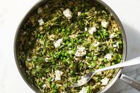 NYT Cooking: Similar to spanakorizo, a Greek spinach and rice dish, this easy, meatless meal features orzo, spinach, peas and scallions. It is deeply satisfying but still on the lighter side of pasta recipes, thanks to all those vegetables. A little feta gives it creaminess and tang, while some lemon zest brightens everything up. It makes a complete meal on its own, or, if you’re looking for something more sub