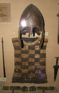 Chalcidian helmet and checkerboard patterned scale shirt armour, 5th century BCE.