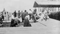 New York--Ellis Island Summary Dock with immigrants in foreground. Created / Published [between 1909 and 1932] National Photo Company Collection (Library of Congress). Library of Congress Prints and Photographs Division Washington, D.C. 20540 USA Retrieved from the Library of Congress, https://www.loc.gov/item/98516508/.