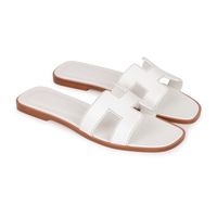 This pair of Oran Sandals are in white box leather with contrast stitching and feature the iconic H crossover strap. Origin: ItalyCondition: Pristine; new or never wornAccompanied by: Hermes box, dustbags, carebook and ribbonSize: 38 EU