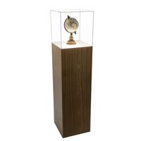 Offering an elegant and warm aesthetic, our Walnut Wood Lighted Pedestal Display Case with Acrylic Cover protects and properly highlights any item. Because natural wood varies in grain and color, each piece is one of a kind and is available in multiple heights and footprints. Durable and easy to clean, this eye-catching lighted display case comes with a built-in LED light that will beautifully accentuate your object.