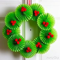 Deck the halls with a very merry paper fan Christmas wreath! Plus lots more DIY wreaths and ideas ...