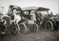 Some of the spectators of the Wright Brothers flights, Fort Myer, VA, July, 1909. Pictured are Mrs. Longworth; Sec. Knox; Undentified man; Sec. Nagel Contributor Names Harris & Ewing, photographer Library of Congress Prints and Photographs Division Washington, D.C. 20540 USA Photograph. https://www.loc.gov/item/2016863803/.