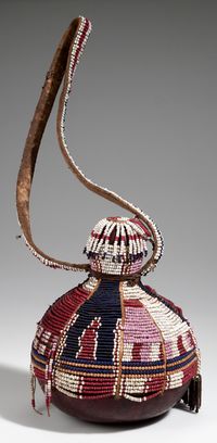 Africa | Container with stopper, from the Kamba people of Kenya | Gourd, glass and metal beads, leather / hide carrying strap | ca. 1949 or earlier