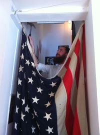 Showing our love for the stars and stripes by hanging a vintage American flag in our Cheltenham shop.