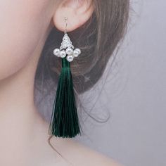 Elevate any outfit with these handmade tassel earrings. Made with premium silk tassels and faux pearl tassel caps, featuring a delicate filigree pattern. A perfect gift for New Year's or Christmas. Style them with a simple dress or blouse for an elegant look, pair with flowy top and denim for a bohemian vibe, or dress up a casual outfit with these statement earrings. Showcase the earrings fully by wearing your hair up, and perfect for special occasion like weddings or parties. ⚜Item Specifics ❀ Tassel Earrings For Wedding, Elegant Tassel Earrings For Party, Dangle Tassel Earrings For Evening, Elegant Tassel Earrings With Fringe As Gift, Elegant Tassel Earrings For Festive Occasions, Elegant Green Tassel Earrings With Fringe, Elegant Green Dangle Tassel Earrings, Festive Dangle Tassel Earrings, Elegant Green Jewelry With Tassels