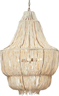 a white chandelier hanging from the ceiling with fringed fabric on it's sides