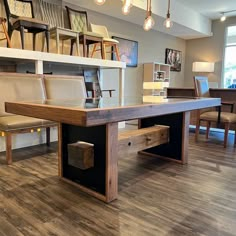 a large wooden table sitting in the middle of a room