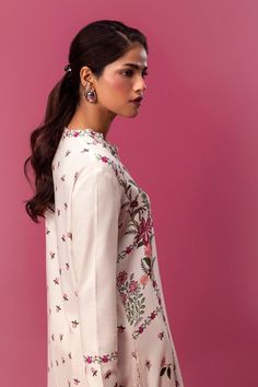 Brand: Sana SafinazProduct Code: H243-007A-2ACCollection: Mahay by Sana Safinaz Unstitched Winter CollectionFabric: Linen DESIGN DETAILS: Digital Printed Shirt Front On Linen 1.15 Meters Digital Printed Shirt Back On Linen 1.15 Meters Digital Printed Sleeves On Linen 0.65 Meters Embroidered Patti On Organza 1 Meter Rotary Printed Cambric Pants 1.75 Meters DISCLAIMER:* Lining, Laces, and Tassels are not included in unstitched variants.* Embellishment items in stitched outfits are subject to market availability.* Product color may vary due to photographic lighting or your device settings. CARE INSTRUCTIONS: Extra Fabric Has Been Used For Shoot Original Color May Vary Slightly From The Picture Dry Clean Recommended Iron The Clothes At Moderate Temperature Do Not Use Bleach, Or Stain Removing Designer Wear Blouse With Printed Motifs, Floral Embroidery Sharara For Eid, Eid Floral Embroidered Sharara, Eid Floral Embroidery Sharara, Designer Tops With Printed Motifs, Fitted Silk Palazzo Set With Floral Embroidery, Floral Print Blouse Piece For Wedding, Silk Sets With Chikankari Embroidery, Floral Print Palazzo Set For Wedding