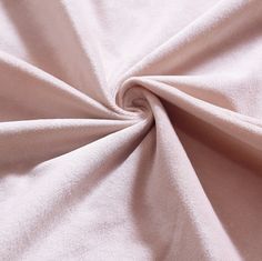 a close up view of a pink fabric