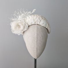 THIS ONE IS MADE TO ORDER IN IVORY OR YOUR CHOICE OF COLOR ☀ Follow this link for more beautiful choices from 'Indigo Hats' https://www.etsy.com/shop/IndigoHats ☀ GRACE - Bandeau in Ivory This stylish hat looks fabulous on - and is so light and easy to wear. I hand blocked this sophisticated bandeau shape, covered it in silk and then in this gorgeous acanthus leaf design with dainty sequins.   I added a lovely matching wild silk rose from England to give it a vintage feel, the matching ivory vei Adjustable Wedding Headband Costume, White Mini Hat Headband For Ceremony, Elegant White Round Crown Headpiece, Cream Bridal Accessories For Mother Of The Bride, Wedding Costume Hats And Headpieces With Handmade Flowers, White Pinched Crown Hat For Wedding, White Headpiece For Royal Ascot With Pinched Crown, Elegant Wedding Hats And Headpieces With Handmade Flowers, Handmade Flowers Adjustable Fascinator For Wedding