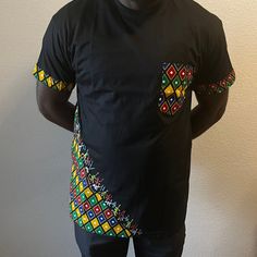 100% Cotton African Pocket shirt in three colors white, black, yellow. Black Crew Neck Short Sleeve Shirt For Summer, Casual Black Crew Neck Short Sleeve Shirt, Black Short Sleeve T-shirt With Side Pockets, Fitted Black Tops With Pockets, Cotton Short Sleeve Shirt With Side Pockets, Cotton Shirt With Side Pockets And Short Sleeves, Black Crew Neck Tops With Pockets, Black Crew Neck T-shirt With Side Pockets, Black Crew Neck Top With Side Pockets