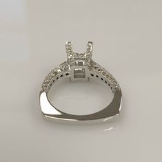 *NEW ITEM* This European style engagement ring is embellished with 1.0 carat of small round diamonds descending down from the tops of each prong, over the gallery and halfway down the band. A very popular design, the euro-shank to many brings a new meaning of comfort with its thick square edges and brings balance to the ring when wearing. A unique and modern piece comes this ring that is quite the special find for special occasions. Ring Details: 18k White Gold Square Four Prong Basket European Classic Jewelry With Princess Cut Side Stones, Princess Cut Diamond Ring With Prong Setting For Proposal, Formal Diamond Jewelry With Side Stones, Classic Princess Cut Jewelry With Side Stones, Princess Cut White Gold Jewelry With Side Stones, Luxury Diamond Jewelry With Side Stones, Elegant Princess Cut Jewelry With Side Stones, Classic Round Band Jewelry With Side Stones, Silver Diamond Ring With Side Stones In Round Cut