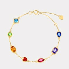 Brighten up any outfit with this fabulous Rainbow Gem Bracelet! Perfect for brightening up any day during back-to-school season, this sparkly piece is sure to get some double-takes! Accessorize with confidence when you rock this colorful bling! DETAILS Plating: 10K Gold Materials: 10K Gold on  S925  Silver,   Cubic Zirconia Length: 7.09"(18cm) Silver Weight: 2.61g Dope Jewelry Accessories, Family Bracelets, Cubic Zirconia Bracelet, Chanel Perfume, Gems Bracelet, Rainbow Jewelry, Jewelry Lookbook, Gold Plated Bracelets, Jewelry Manufacturers