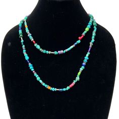 Discover our versatile 44-inch Long Beaded Necklace, a stunning piece inspired by the vibrant Southwest. This necklace can be worn either as a single long strand or stylishly double-wrapped. The necklace features a delightful mix of turquoise beads ranging from 5mm to 10mm in diameter, alongside accent beads including red coral, malachite, amethyst, azurite, and lapis. Sterling silver daisy spacer beads and sterling silver accent beads add an elegant touch to the design. With no clasp required, it's hassle-free to wear and truly colorful, reflecting the rich culture of the Southwest. Elevate your style with this Southwestern-inspired accessory. Each item in our store is truly unique. We do not produce duplicates, and once a piece is sold, it will never be recreated.  50% of the proceeds fr Long Turquoise Beaded Necklace For Festivals, Turquoise Beaded Long Necklace For Festivals, Festival Turquoise Necklace With Colorful Beads, Turquoise Necklace With Colorful Beads, Green Turquoise Gemstone Beads Necklace For Beach, Turquoise Multi-strand Beaded Necklace For Festivals, Artisan Turquoise Double Strand Beaded Necklace, Turquoise Lariat Beaded Necklace With Colorful Beads, Artisan Turquoise Beaded Necklace For Beach