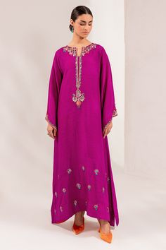 Kameez Trouser Raw Silk Pakistani Eid Dress in Magenta color is a beautiful masterpiece adorned with hand-crafted details of Beads, Motifs, and Sequins. Anarkali Raw Silk Kaftan With Resham Embroidery, Silk Kaftan With Mirror Work, Eid Kaftan With Resham Embroidery In Raw Silk, Eid Raw Silk Kaftan With Resham Embroidery, Silk Kaftan With Intricate Embroidery For Festive Occasions, Festive Silk Kaftan With Intricate Embroidery, Festive Embroidered Raw Silk Kaftan, Straight Kurta Kaftan In Silk With Dabka Work, Bollywood Style Embroidered Raw Silk Kaftan