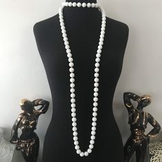 ON SALE Huge Sale Going On Now.... Ends Soon!! Alice Caviness Designer signed long flapper Lanks beaded necklace in very good vintage condition. The beads themselves measure just over 1/2 inch in width and the length of the necklace is 64 inches long.A really niceStatement necklace. Formal White Single Strand Beaded Necklace, White Long Beaded Necklace For Party, White Long Beaded Necklaces For Party, White Single Strand Necklace With Round Beads, White Formal Beaded Necklace, Elegant White Beads For Formal Occasions, White Beaded Necklace For Formal Occasions, Formal White Beaded Necklaces With Round Beads, Formal White Beaded Necklace