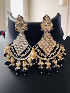 Kundan Meenakari earrings all Blouses come with margin inside for resizing / customization, please leave a message Luxury Round Meenakari Earrings, Luxury Kundan Meenakari Chandelier Earrings, Luxury Meenakari Bridal Dangle Earrings, Luxury Designer Cutdana Earrings, Ornate Meenakari Earrings For Festive Occasions, Traditional Enamel Jewelry With Matching Earrings, Traditional White Pearl Earrings, Traditional White Pearl Pierced Earrings, Traditional Black Meenakari Jewelry