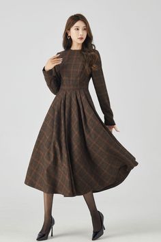 Rock the chic look with this Long Sleeve Plaid Midi Wool Dress. Stay cozy and stylish all day. 

SKU 4523 
Link in bio 

#Fashion #WinterStyle #PlaidDress #MidiDress #WoolDress #Xiaolizihandmade Elegant Plaid Midi-length Dress, Formal A-line Tweed Dress For Fall, Wool Long Sleeve Midi Dress For Fall, Fall Long Sleeve Wool Midi Dress, Wool Midi Dress With Long Sleeves For Fall, Fall Wool Midi Dress With Long Sleeves, Fitted A-line Plaid Dress For Fall, Classic Long Sleeve Fall Dresses, Plaid Long Sleeve Midi Dress For Work