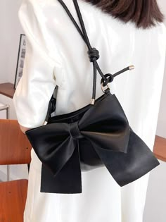 Bag For Love - Bow Decor Knot Detail Square Bag - Women Shoulder Bags Product Description Color Black Style Elegant Pattern Type Plain Bag Size Medium Quantity 1 piece Details Bow Type Square Bag Composition 100% Polyurethane Material PU Leather Size Chart INCH CM Size Bag Width Bag Height Bag Length one-size 2 7.5 10.2 Size Bag Width Bag Height Bag Length one-size 5 19 26 Similar Products h2 { text-align: center; } .red-box { width: 100%; display: flex; flex-direction: row; flex-wrap: wrap; jus Black Shoulder Bag For Party With Large Capacity, Black Large Capacity Shoulder Bag For Party, Large Capacity Black Shoulder Bag For Party, Portable Black Bucket Shoulder Bag, Portable Black Shoulder Bucket Bag, Black Large Capacity Bag For Party, Black Party Bag With Large Capacity, Black Portable Party Bags, Portable Black Party Bag