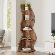 a wooden shelf with books on it in a living room