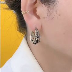 Color: Golden Black Diamond Ear Clip Fashion Element: Ring Style: Fashion OL Elegant Single Black Earring, Elegant Black Single Earring, Elegant Black Alloy Jewelry, Trendy Black Pierced Hoop Earrings, Black Hoop Jewelry Gift, Black Hoop Jewelry For Gifts, Elegant Alloy Hoop Earring, Black Elegant Hoop Earrings, Black Pierced Crystal Earrings For Party