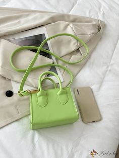 BirdinBag - Neon-Green Double Handle Square Bag - Compact and Chic Green Rectangular Box Bag With Adjustable Strap, Green Square Phone Bag With Adjustable Strap, Green Satchel With Mobile Phone Bag For Shopping, Green Handheld Phone Bag For Daily Use, Green Mobile Phone Bag For Spring, Spring Green Mobile Phone Bag, Handheld Green Phone Bag For Daily Use, Rectangular Satchel For School In Spring, Rectangular Spring School Satchel