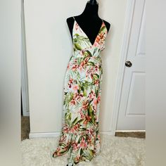 Floral Maxi Dress With Cris Cross Spaghetti Strap Back.. Cami Dresses For Beach Season Vacation, Cami Dress For Beach Vacation, Tropical Floral Print Maxi Dress With Spaghetti Straps, Vacation Maxi Dress With Adjustable Straps, Summer Vacation Cami Maxi Dress, Vacation Cami Dress With Adjustable Straps, Floral Print Spaghetti Strap Vacation Dress, Floral Print Spaghetti Strap Dress For Vacation, Spaghetti Strap Floral Print Vacation Dress