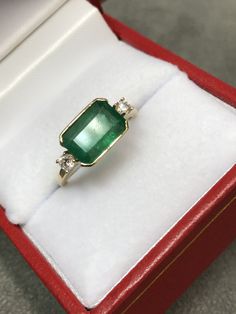 Green 14k Gold Ring With Accent Stones, Green 14k Gold Rings With Accent Stones, 14k Gold Green Rings With Accent Stones, Green 14k Gold Emerald-cut Rings, Green Emerald Cut 14k Gold Rings, Promise Emerald Ring In Yellow Gold, 14k Gold Emerald Cut Rings For May Birthstone, Green Diamond Ring With Accent Stones In 14k Gold, Heirloom Emerald Cut Emerald Ring For Promise