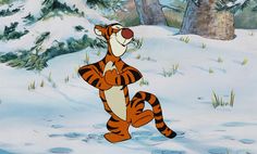 the tigger from winnie the pooh running in the snow