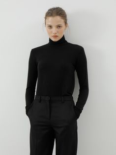 Editor's NotesThis turtleneck top was the one of best item of UIJI in last season. It is upgraded by changing the fabric as an essential item, so it is comfortable, warm and flexible with a stretchy wool jersey fabric. Style it with various items for many different stylings.- Turtle neck design- Stretchy fabric- Comfortable fits- Fits true to size, take your normal sizeMeasurements(in.)One Size (XS - M)- Length : 23.62 in - Shoulder : 13.38 in- Bust : 15.74 in- Sleeve length : 24.8 in* Mode Black Stretch Turtleneck In Fine Knit, Black Stretch Turtleneck With Fine Knit, Black Stretch Fine Knit Turtleneck, Mock Neck Top For Work, Second-skin Turtleneck For Fall Layering, Sleek Fine Knit Tops For Fall, Black Fine Knit Funnel Neck Top, Second-skin Turtleneck Tops For Fall, Snug Fit High Neck Turtleneck For Fall