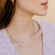 This necklace features fresh water pearls hand strung along a delicate chain. Choose 14kt gold filled or sterling silver, excellent quality that won't tarnish. A modern take on a classic pearl necklace. Simple, classic and beautifully made. Makes a great gift for a friend, family member, bridesmaids, or maybe just for yourself! Choose your length at check out, model wearing 17 inches long. Also checkout the matching bracelet: http://etsy.me/1QkR0y7 The beautiful necklace is perfect for your wedd Everyday 14k Gold Pearl Necklace, Delicate 14k Gold Pearl Necklace With Delicate Chain, Dainty 14k Gold Filled Pearl Necklace For Everyday, Dainty 14k Gold-filled Yellow Gold Pearl Necklace, Everyday 14k Gold Pearl Chain Necklace, Delicate Everyday Pearl Necklace In 14k Gold, Dainty Yellow Gold Pearl Necklace For Everyday, Everyday 14k Gold-filled Pearl Necklace With Delicate Chain, Delicate Everyday 14k Gold Pearl Necklace