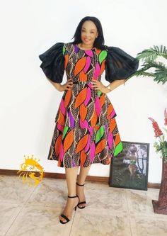 An elegant African two sisters dress to rock that special occasion. Multicolor A-line Midi Dress For Cocktail, Printed Dresses For Party, Printed Short Sleeve Party Dress, Short Sleeve Printed Party Dress, Multicolor Long Party Dress, Short Sleeve Printed Maxi Dress For Parties, Multicolor Short Sleeve Midi Dress For Party, Multicolor Knee-length Midi Dress For Party, Elegant Printed Party Dresses