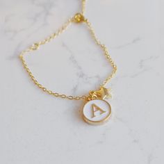 Gold plated Initial bracelet, with star charm, chain is 16K gold plated and comes with a 2 inch extender so you can easily adjust it to your desired length. Elegant Initials Charm Bracelet Gift, Gold Charm Bracelet With Initials Gift, Personalized Gold Charm Bracelet With Initials, Adjustable Gold Charm Bracelet With Initials, Adjustable Gold Chain Bracelet With Initials, Watch Charms, Square Bracelet, Initial Bracelet Gold, Custom Charm Bracelet