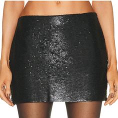 Size Small Black Mini Skirt With Sequins. Never Been Worn With Tags On. Has Shorts Underneath. Fitted Sequin Mini Skirt, Evening Mini Skirt Bottoms With Sequins, Black Sequined Mini Skirt For Party Season, Black Sequined Mini Skirt For Party, Fitted Skort For Cocktail Occasions, Glamorous Black Party Skirt, Black Mini Skirt For Party, Black Mini Length Bottoms For Party Season, Evening Mini Skirt Skort