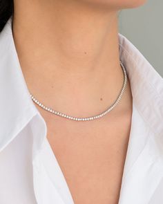 Beautifully handcrafted, classic and timeless 4 prong setting tennis necklace. Available as a 14" choker length up to 20" long in 14k yellow, white and rose gold. Features approximately 4ct. total weight of diamonds. Diamond Color: G-H Diamond Quality: VS Diamond Carat Weight: 16" Approx. 4 ctw/ 0.02 ct per stone Natural white diamond, conflict free, not lab created Standard Production: 2-3 weeks Rush Order Production: 10-15 business days Shipping: Select shipping method at checkout. 2-Day Shipp Timeless Single Strand Diamond White Tennis Necklace, Single Strand Diamond Tennis Necklace, White Diamond Single Strand Tennis Necklace, Classic White Gold Tennis Necklace With Lab Grown Diamonds, Classic White Gold Tennis Necklace With Lab-grown Diamonds, Timeless Tennis Necklace With Diamond Cut As Gift, Timeless Diamond Cut Tennis Necklace As A Gift, Timeless Tennis Necklace With Diamond Cut For Gift, Classic Single Strand Cubic Zirconia Tennis Necklace