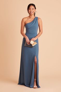 This one-shoulder gown features raised neckline, perfect for bridesmaids who favor a modest look. Available in Twilight. 21st-century Grecian goddess. | Twilight Bridesmaid Dress Crepe Size Medium | Birdy Grey Kira One Shoulder Bridesmaid Dresses, One Shoulder Bridesmaid, Grecian Goddess, Birdy Grey, Blue Bridesmaid Dress, One Shoulder Gown, Convertible Dress, Dress Order, Blue Bridesmaid Dresses