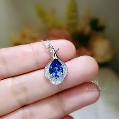 "Full 925 silver Tanzanite necklace decorated with CZ stone Tanzanite jewelry ◆◆Pendant Holder (bezel & Bail) : High Quality 925 Sterling Silver Main Stone:7*9mm Created Tanzanite Whole Pendant Size ( include bail) : 16mm Accent Stone : Cubic Zirconia ◆◆ Necklace chain : Platinum coated 925 sterling silver Box Chain from 16\" to 20\" The model wearing the default size with 18\". Please pay attention to the size Some photos have been enlarged to show details. And others need to minimize for f Pear Shaped Sapphire Necklace For Gift, Pear Shaped Sapphire Necklace As Gift, Pear-shaped Sapphire Necklace Gift, Blue Gemstone Necklace, Tanzanite Pendant, Tanzanite Necklace, Tanzanite Jewelry, Zirconia Necklace, Cubic Zirconia Necklace