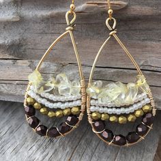 These fun earrings are made with a gold plated drop frame, tarnish-resistant gold plated copper wire, eggplant and gold faceted Czech glass beads, white Japanese seed beads, and citrine chip beads. The ear hooks are 14k gold-plated. These earrings measure 24x47mm and are lightweight. Colors do vary on different monitors; please keep this in mind. ~Care instructions: Not waterproof- do not wear while showering, swimming, etc. As with all jewelry, keep away from children and pets, and store in a d Bohemian Beaded 14k Gold Filled Earrings, Bohemian 14k Gold Filled Beaded Dangle Earrings, Bohemian 14k Gold-filled Beaded Dangle Earrings, Bohemian 14k Gold Filled Beaded Earrings, Bohemian 14k Gold-filled Beaded Earrings, Bohemian 14k Gold Filled Round Beaded Earrings, 14k Gold-filled Beaded Drop Earrings, Dangle Beaded Earrings With 14k Gold Filled, Handmade Adjustable Beaded Earrings In 14k Gold Filled